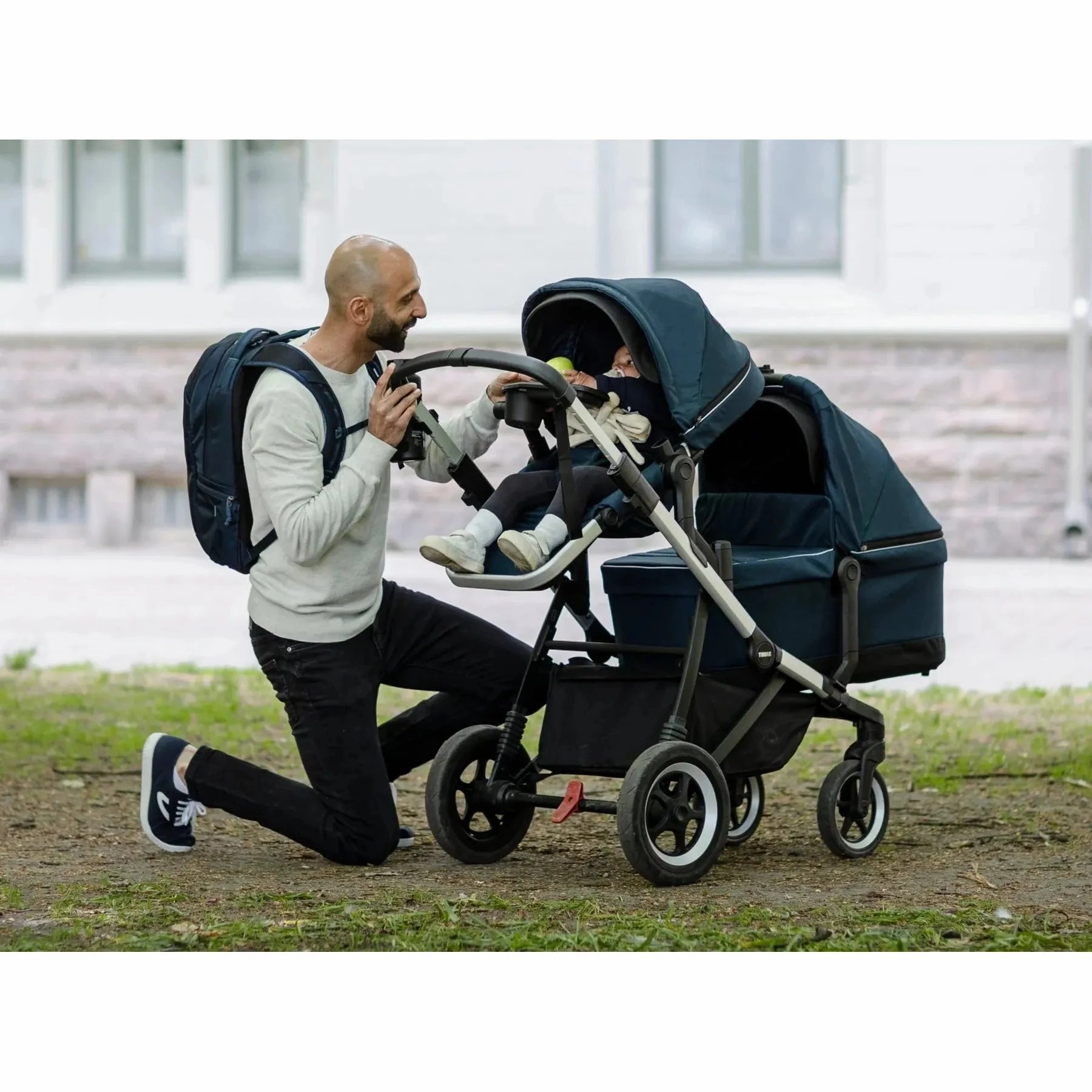 Thule Sleek: Convertible Single-to-Double Urban Stroller   Sibling Seat