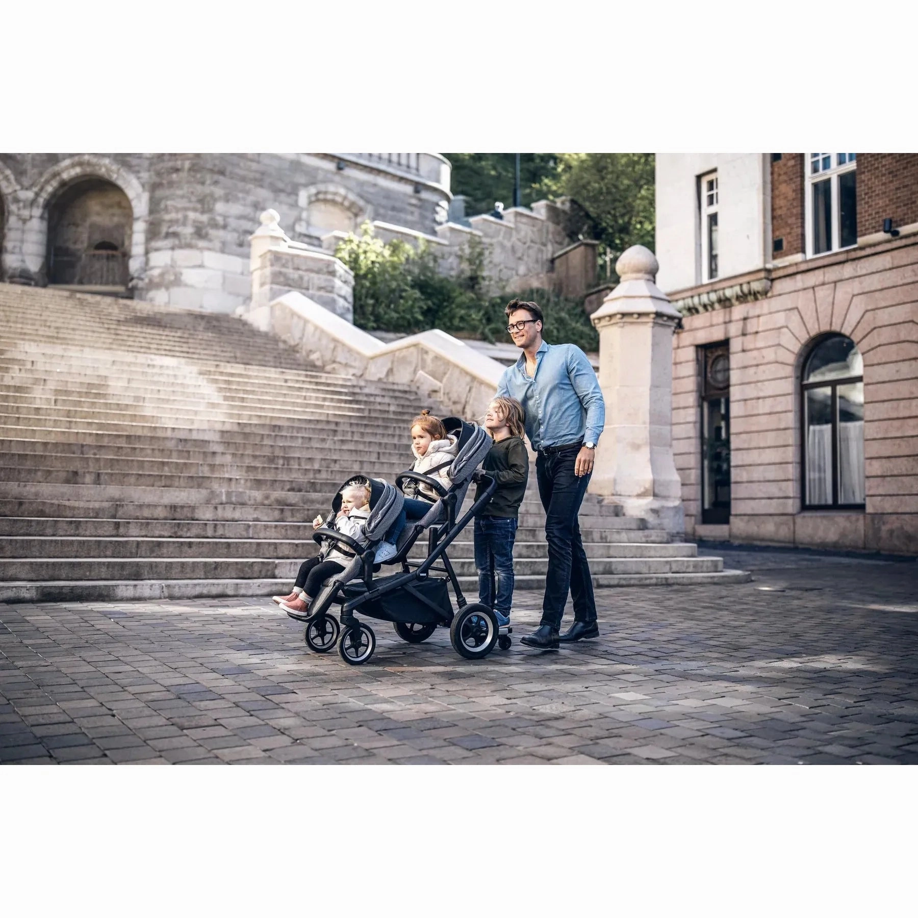 Thule Sleek: Convertible Single-to-Double Urban Stroller   Sibling Seat