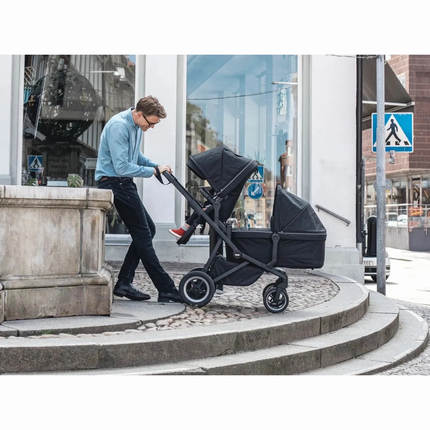 Thule Sleek: Convertible Single-to-Double Urban Stroller   Sibling Seat